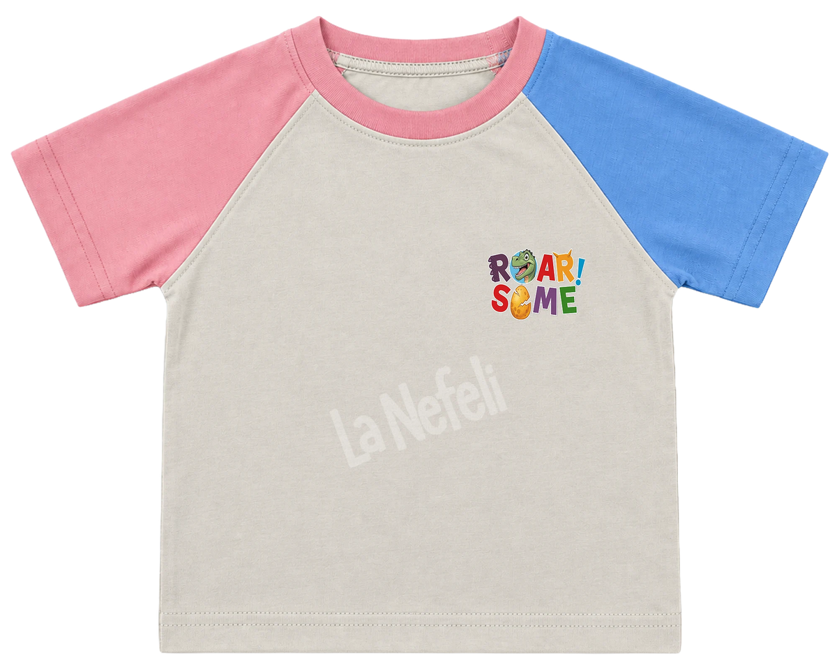 Roarsome dinosaurs kids' T-shirt, pink and blue raglan sleeves, pink collar, a small Roarsome logo on the chest