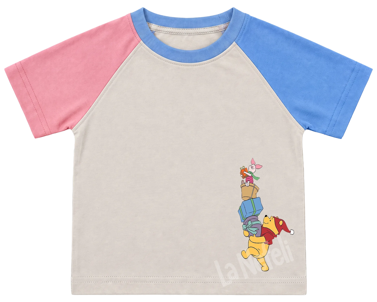 Winnie the Pooh castle parade kids' T-shirt, pink and blue raglan sleeves, blue collar, small Pooh and friends on the chest