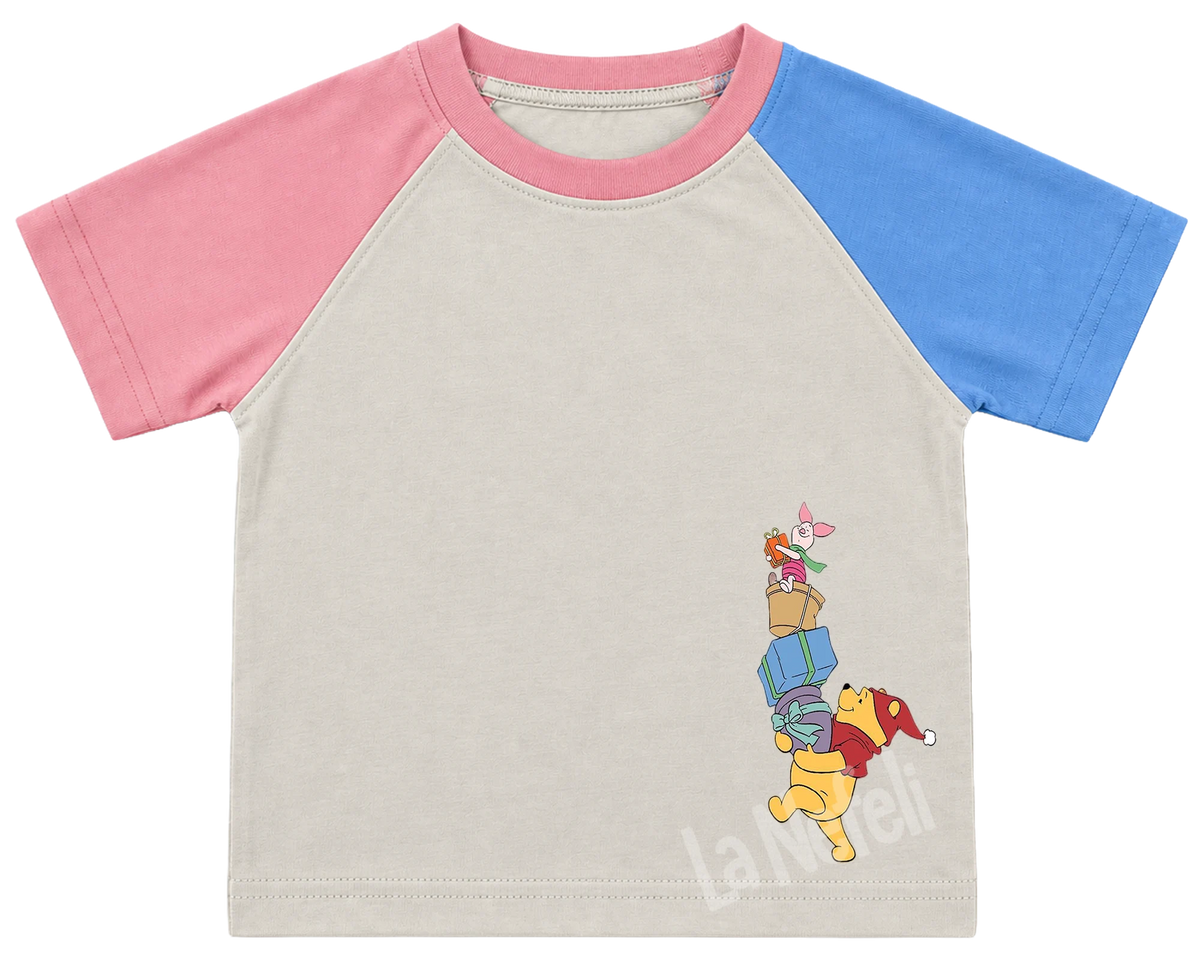 Winnie the Pooh castle parade kids' T-shirt, pink and blue raglan sleeves, pink collar, small Pooh and friends on the chest